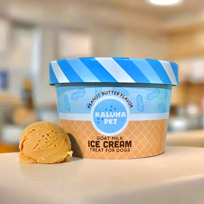 Peanut Butter Dog Ice Cream Mix, showing an ice cream cup with a scoop of tan ice cream to the side of it